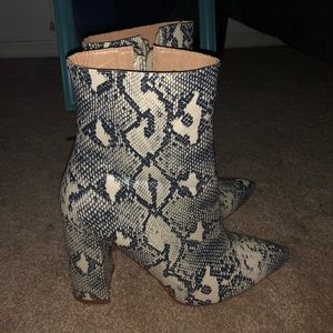 Snakeskin heel booties